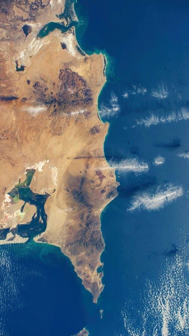 Feathery Clouds Above Pacific Ocean Captured from ISS